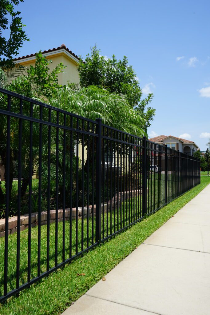 black metal fence around Florida home