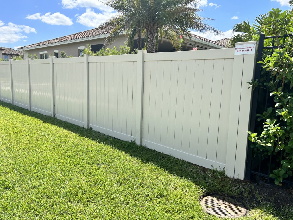 white fence around Florida home