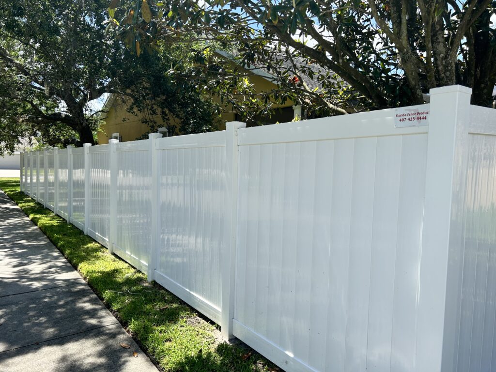 white fence around Florida home